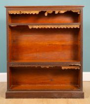 A late 19th century oak floor standing open bookcase