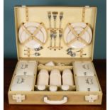 A 'Brexton' vintage picnic set with a fitted interior