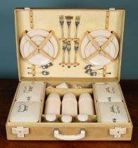 A 'Brexton' vintage picnic set with a fitted interior