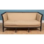A contemporary French style dark stained beechwood sofa