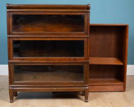 A Globe Wernicke stacking bookcase together with a Herbert E Gibbs teak open bookcase