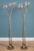 A pair of floor standing lights by Christopher Wray Lighting