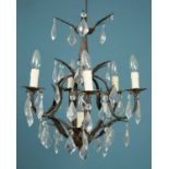 A decorative French style chandelier or electrolier