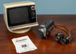 A Super 8 camera by Bell & Howell; together with an Elizabethan 9-inch Model T9 television