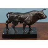 A bronzed model of a bull