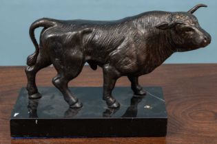 A bronzed model of a bull
