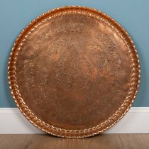 A large Indian copper tray