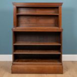 A 19th century mahogany two-section open bookcase