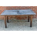 A teak rectangular garden table