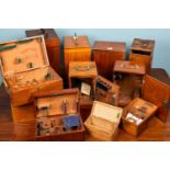 A collection of sixteen wooden microscope boxes