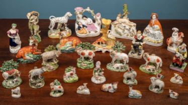 A collection of Staffordshire figures