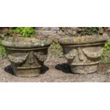 A pair of cast reconstituted stone garden planters