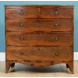A Regency mahogany bow front chest of two short over three long drawers, with ring handles and