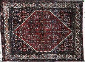 A 1920's red ground Hamadan rug