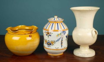 A tin glazed albarello together with a planter and vase