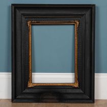 An ebonised frame with a wiggle-work banding