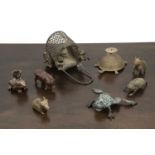 Group of metalware African, including a cart with toads, 22cm long and 6 other pieces.At present,