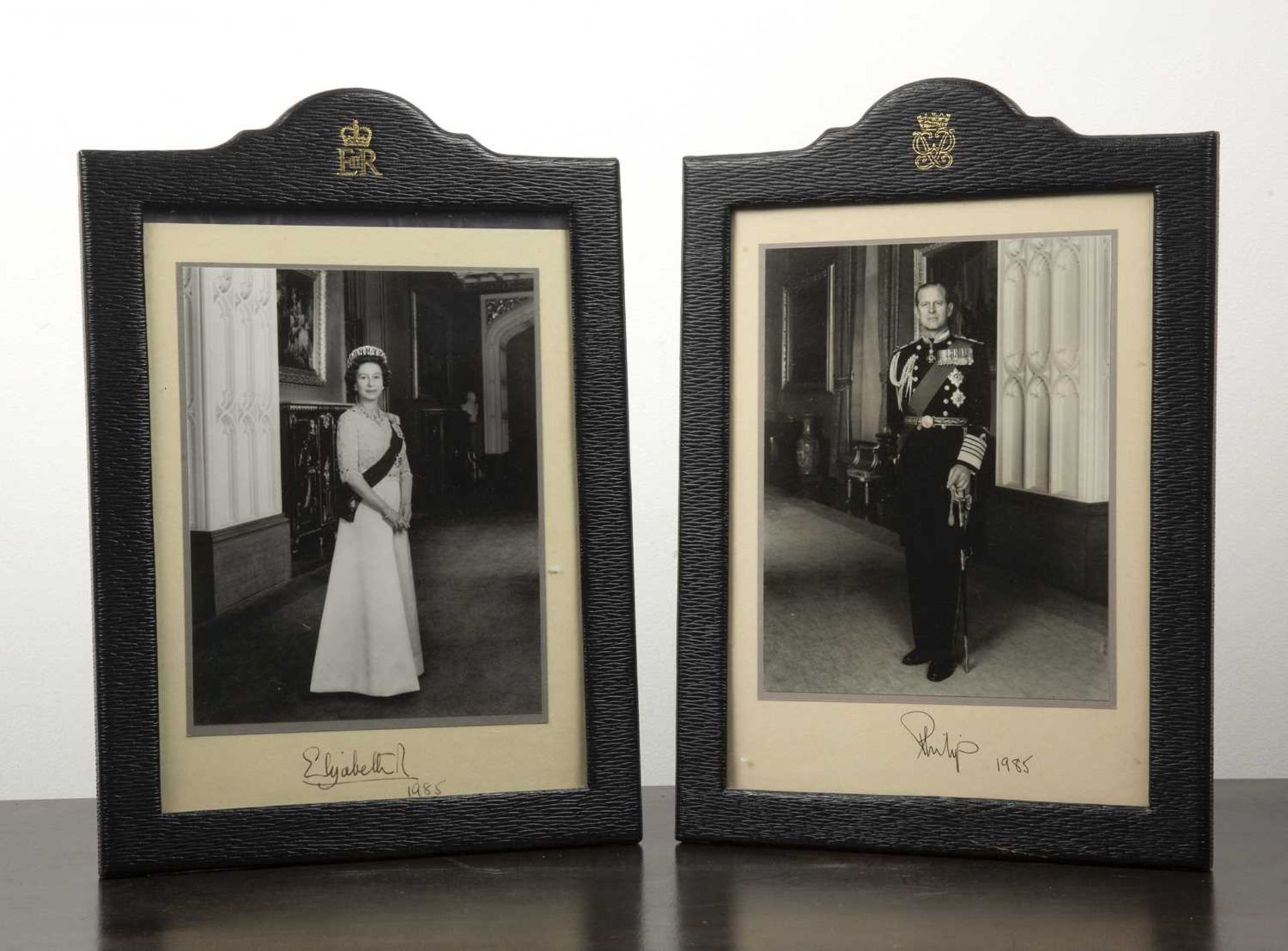 Pair of full-length photograph studies of Queen Elizabeth II and Prince Philip both signed and dated