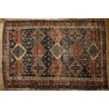 Multicoloured rug Caucasian, with overall geometric design, 206cm x 136cmWorn and with losses.