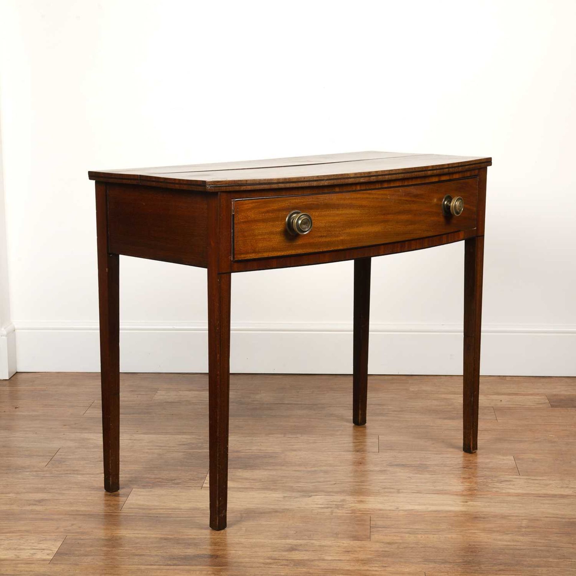 Mahogany bow fronted side table with single frieze drawer and brass handles, standing on square - Image 2 of 5