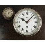 Ship's clock in a brass and silvered case by Story of Barrow, 18cm and a small 8 day clock with a