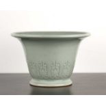 Celadon jardiniere Chinese, of tapering form with moulded designs above the base, 29cm diameter x