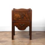 Mahogany commode with galleried top George III, two doors above a pull our commode section, with