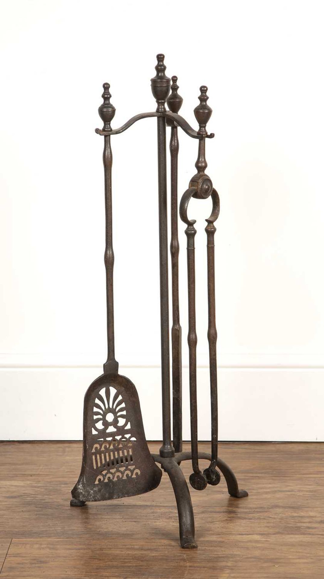 Fireplace companion set 20th Century, iron, the stand on tripod base, 78cm high overall Overall