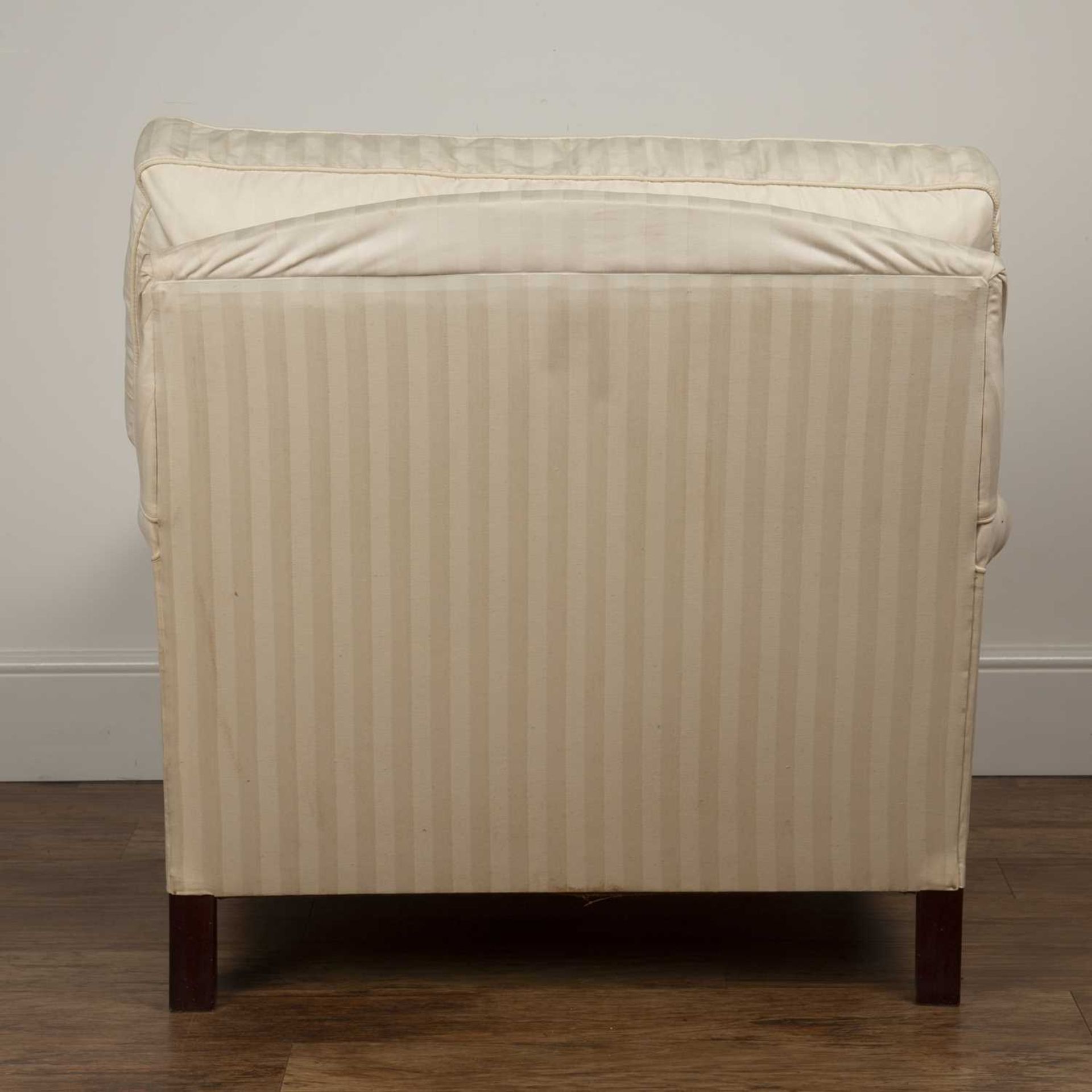 Howard style armchair Contemporary, with white striped upholstery, on brass castors, 86cm wide - Image 4 of 5