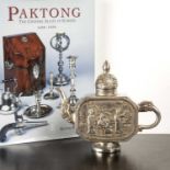 Paktong teapot Chinese, of octagonal form with two panels of figures, 4 character mark to the