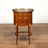 French marquetry side table of oval form, 19th Century, with brass galleried top, the top inlaid