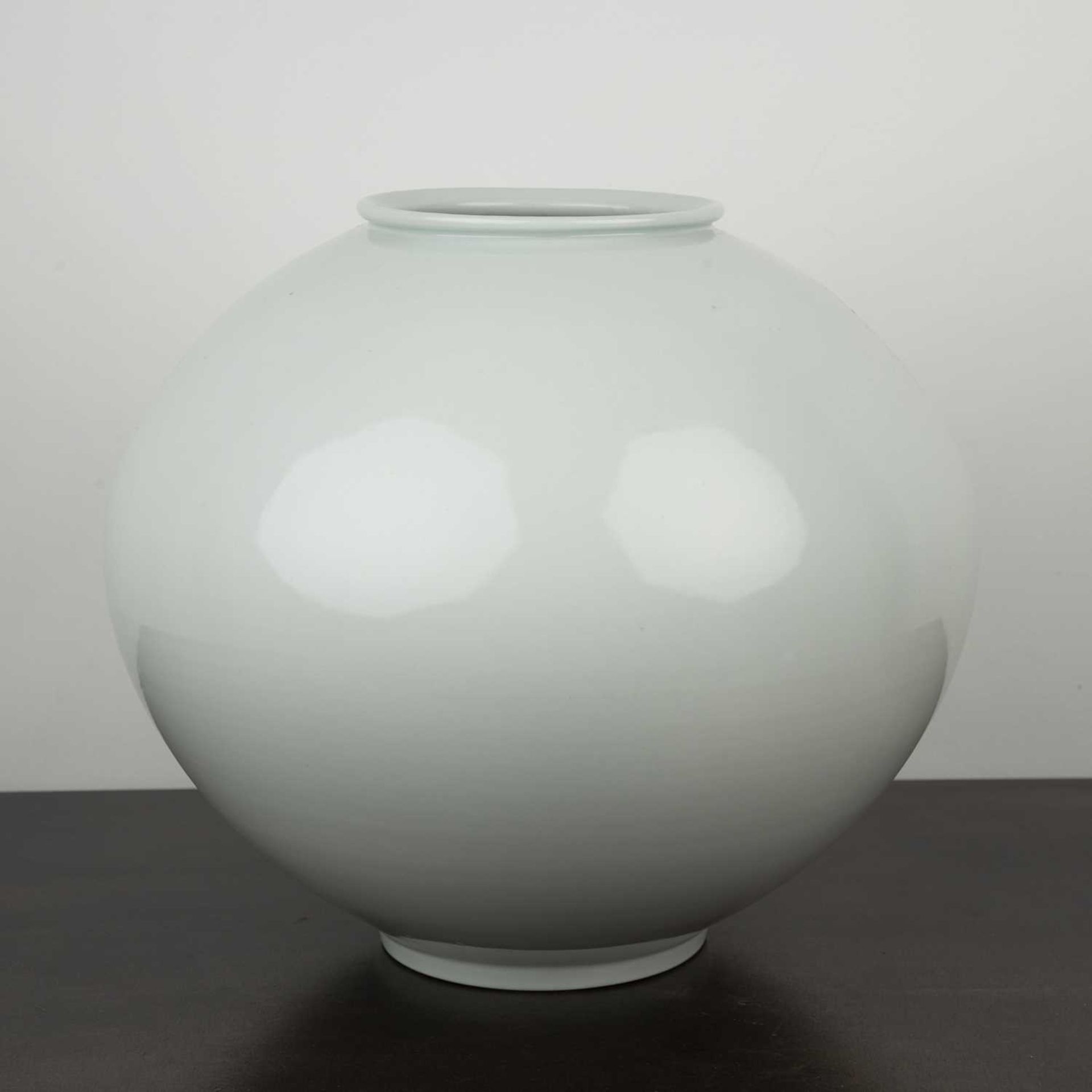 White ground ovoid vase Japanese, 20th Century, with monochrome view of a landscape and figure, mark - Image 2 of 3