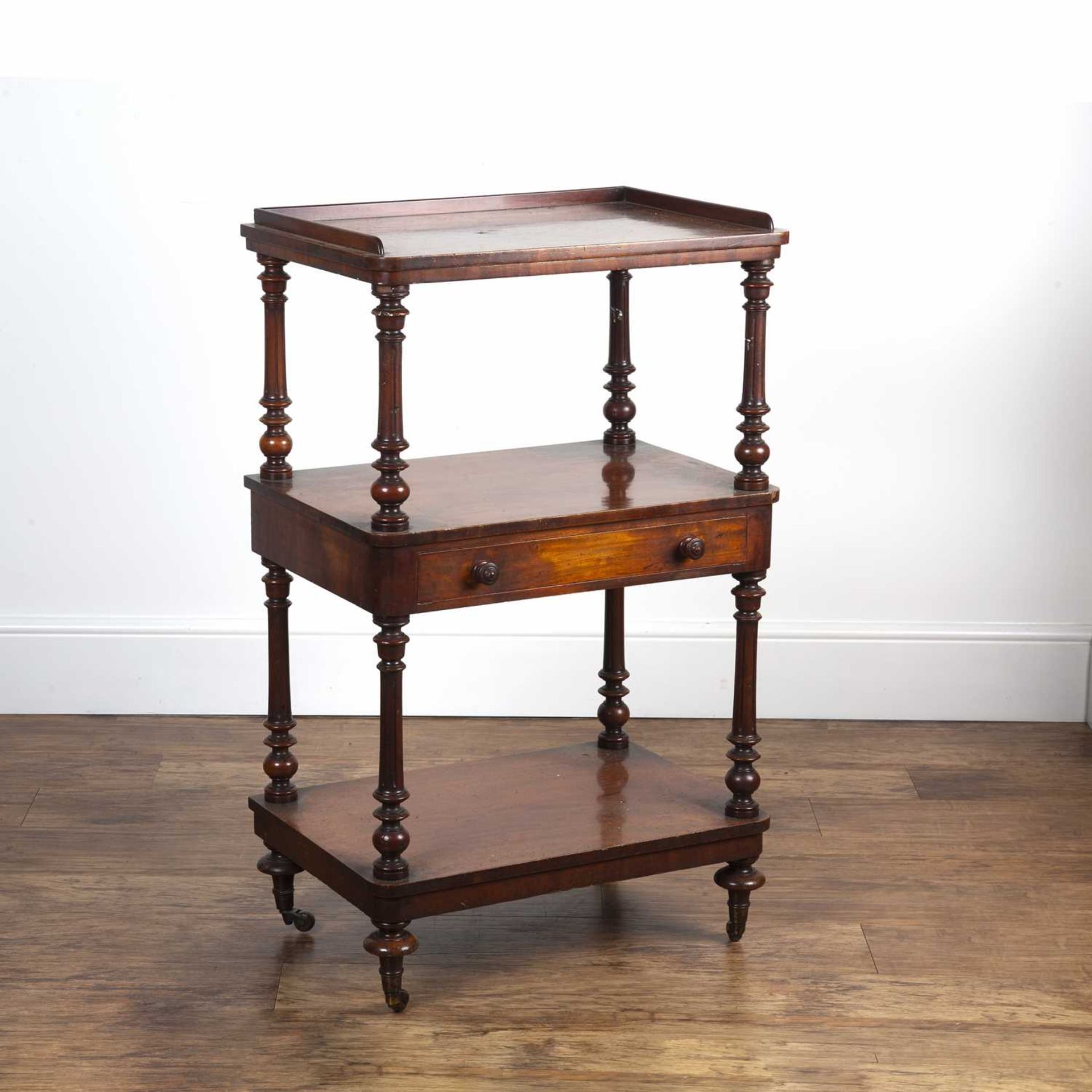 Mahogany three tier buffet stand 19th Century, with galleried top and single fitted drawer, standing