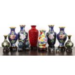 Group of cloisonne vases Chinese, 20th Century, including stands and a cinnabar lacquer vase,
