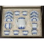 Blue and white rice pattern contemporary coffee set Chinese, comprising six coffee cups and saucers,