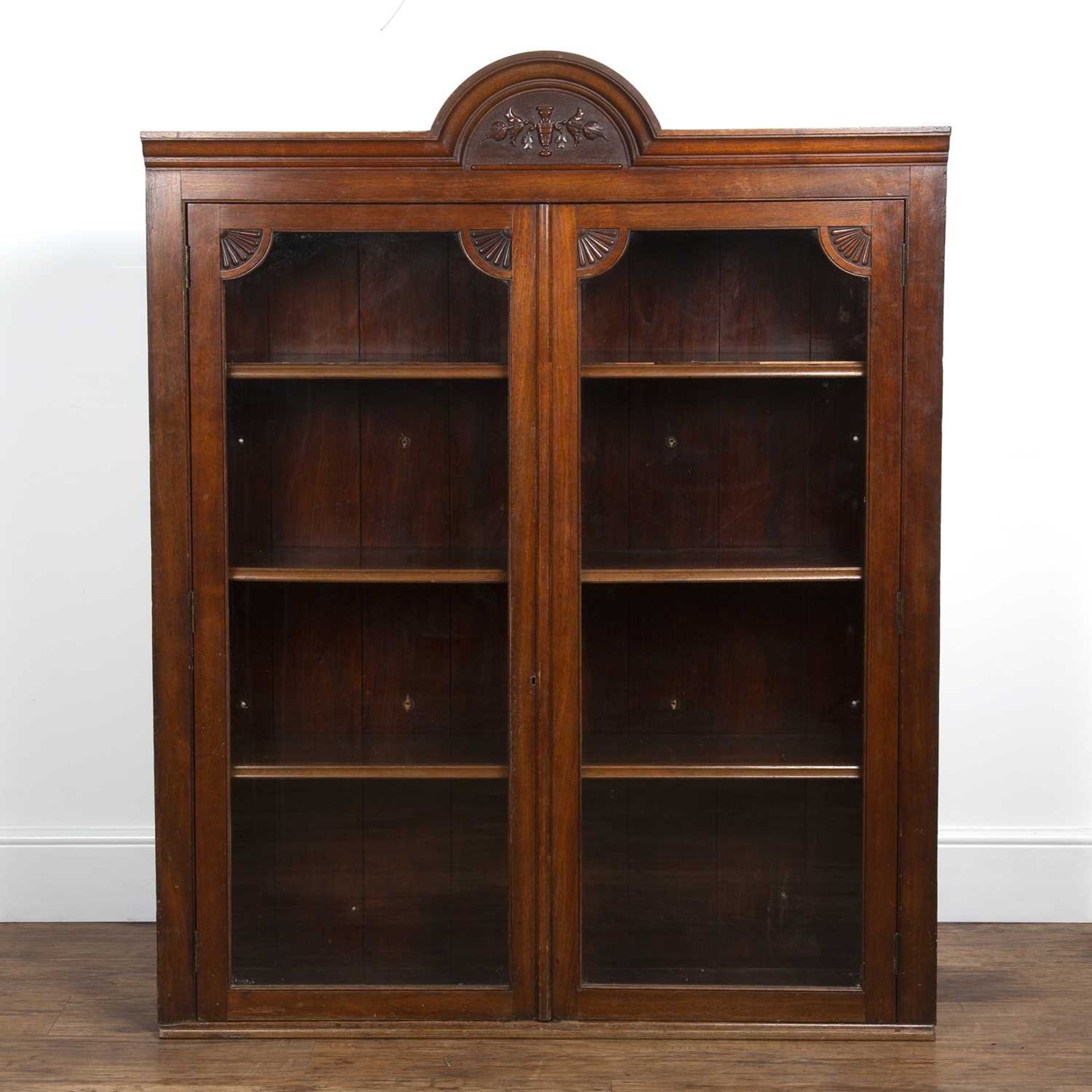 Glazed mahogany wall cabinet 19th Century, with an arched pediment, 119cm wide x 154cm high x 31cm