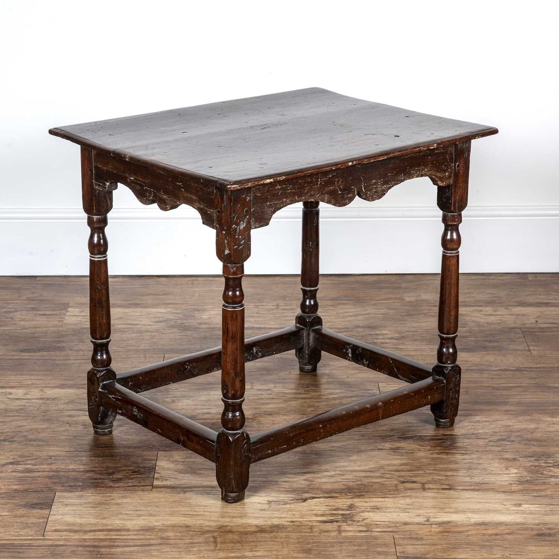 Oak and Yewood side table 18th Century and later, with a rectangular top and shaped frieze, standing