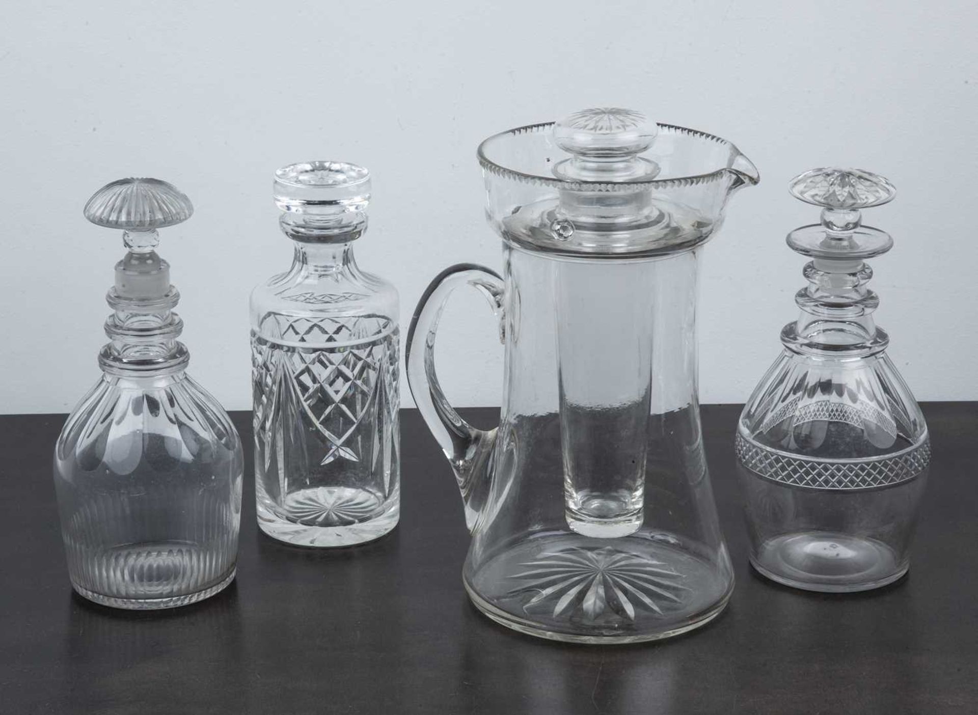 Collection of decanters including three decanters with lids and cut decoration, and a large glass - Image 2 of 2