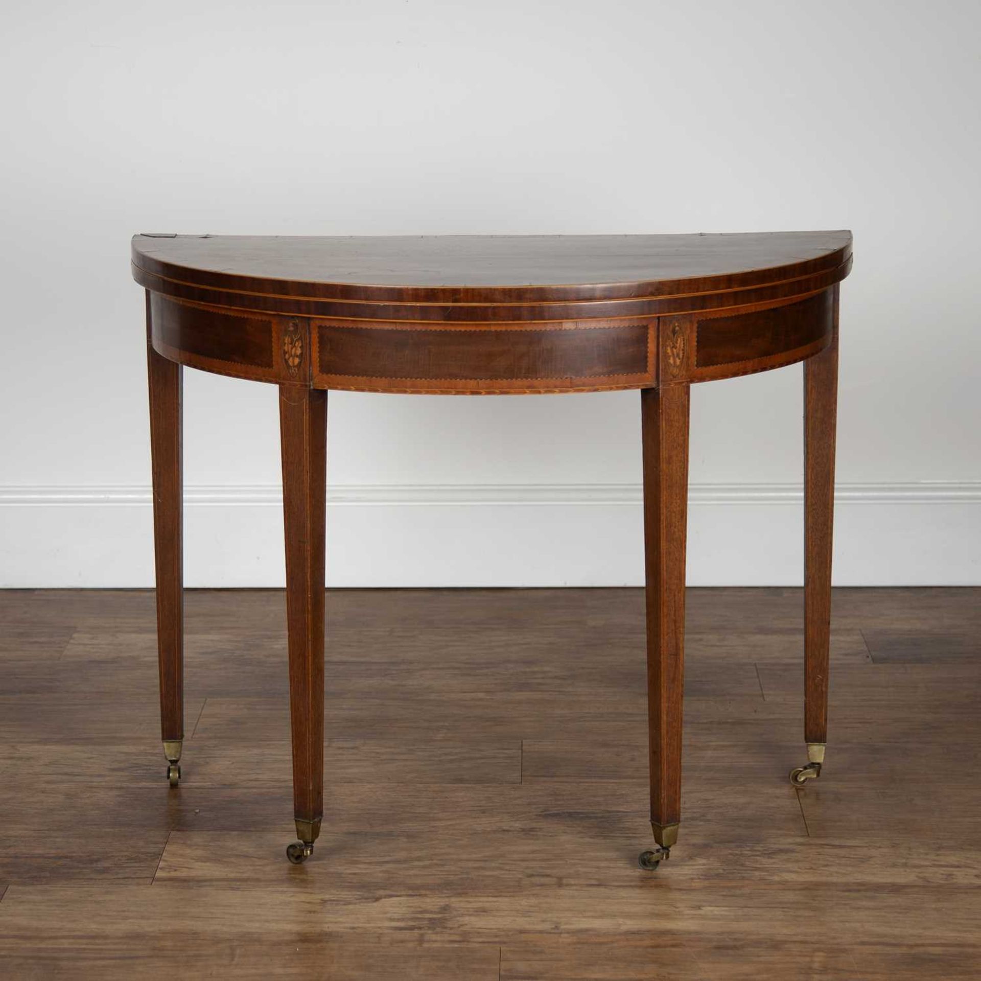 Mahogany marquetry inlaid card table George III, with fold over top and green baize lining, on