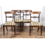 Set of four rosewood bar back dining chairs early 19th Century, with green striped upholstered