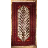 Red and cream ground rug Afghanistan, with central foliate panel and multiple borders, 152cm x