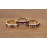 Collection of rings comprising of: a 9ct ring inset with seven pink stones (untested), size L, 2g