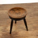 Scottish School low stool with ebonised base and circular pokerwork top reading 'Sit ye doun',