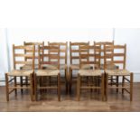 Gordon Russell (1892-1980) Set of eight ash ladderback chairs with rush seats, and turned