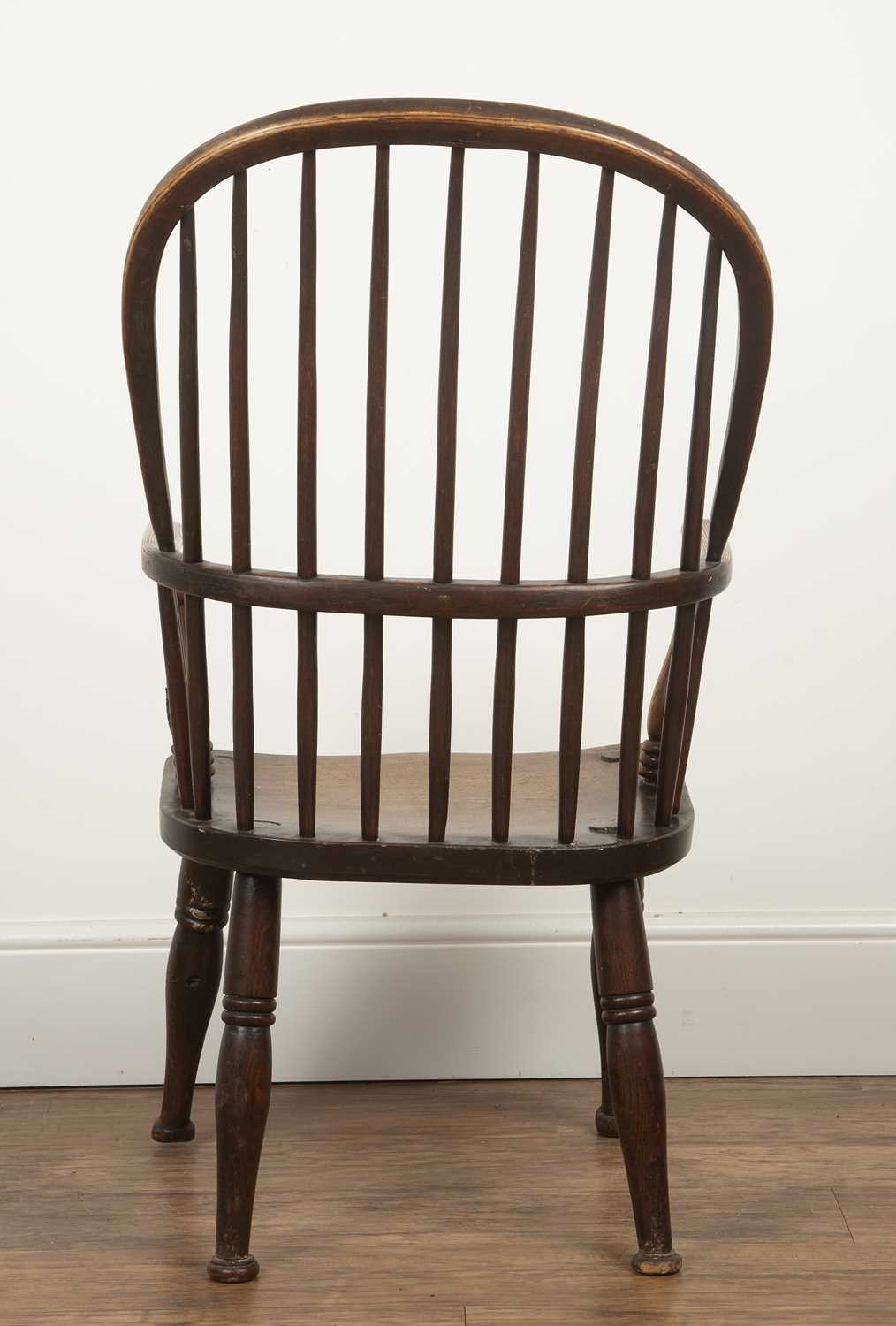 Windsor chair ash and elm, 19th Century, with hoop spindle back, 98cm high overallHeavy wear, - Image 4 of 7