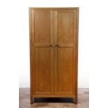 Gordon Russell (1892-1980) oak, 'Coxwell' wardrobe, design 841, circa 1925, with plaque to the