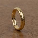 22ct gold band of with old engraved decoration, size O/P, bearing marks for Birmingham, 1987, 7g