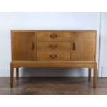 Gordon Russell (1892-1980) Oak, 'Shenberrow' sideboard with two cupboards flanking drawers,