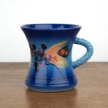 Richard Godfrey (1949-2014) studio pottery cup or mug, with abstract design on blue ground,