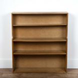 Cotswold School oak open waterfall bookcase, with one fixed and two height adjustable shelves,